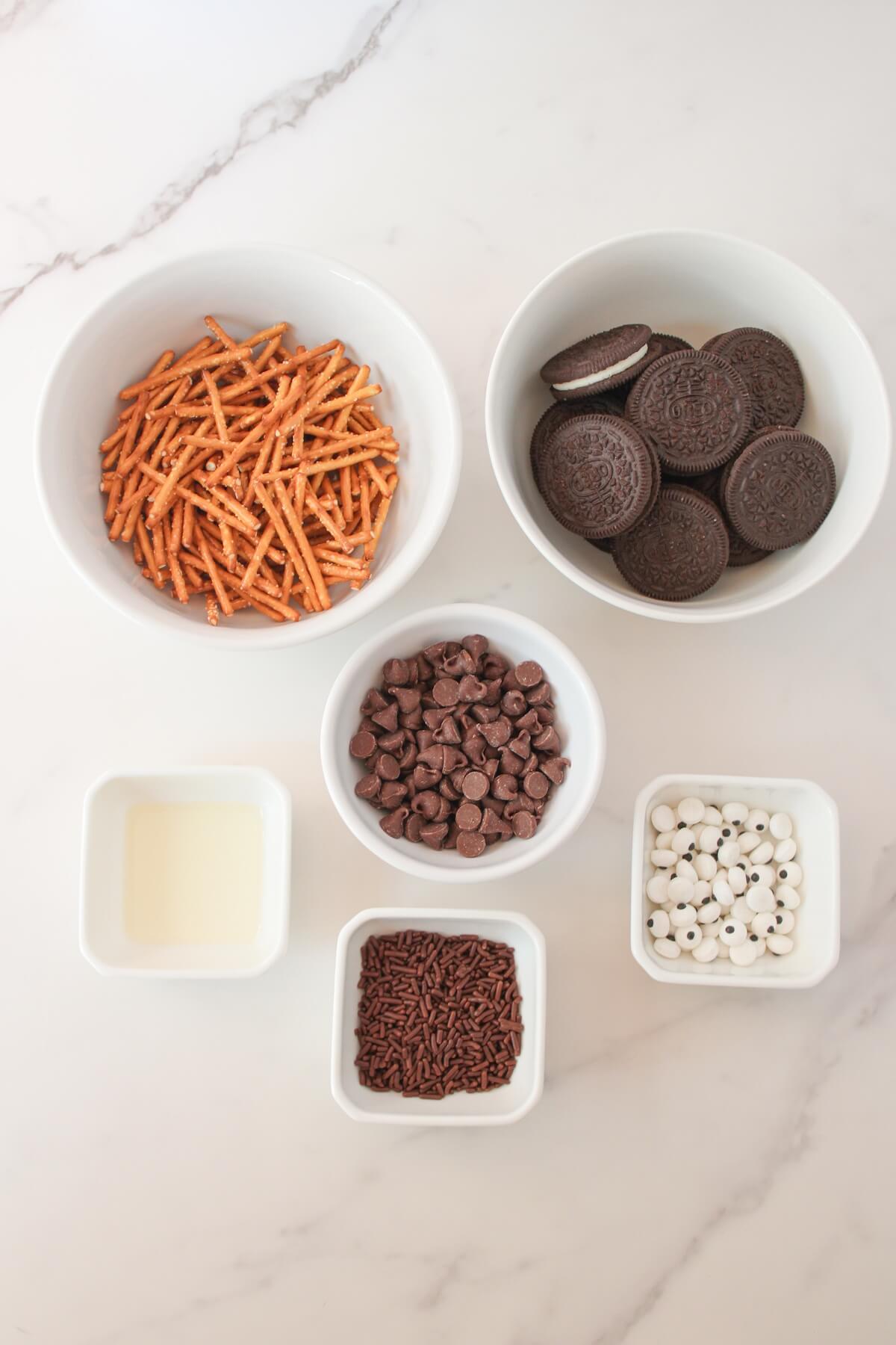 ingredients for oreo spider cookies.