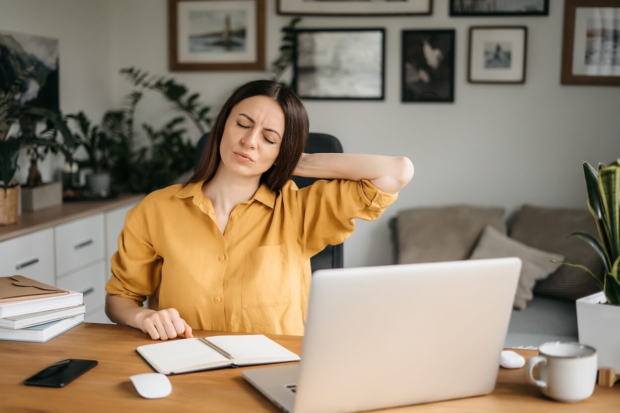 woman stressed about goal setting.