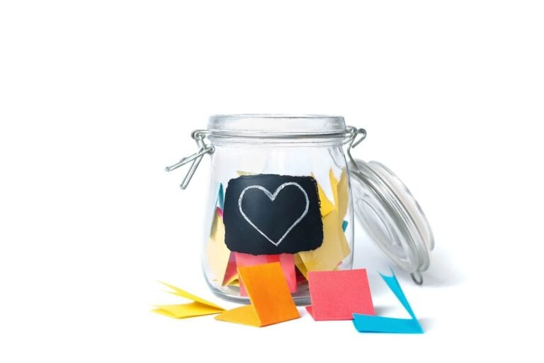 jar with slips of gratitude notes in it.